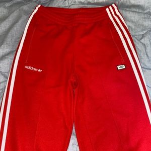 Red pants with white stripes